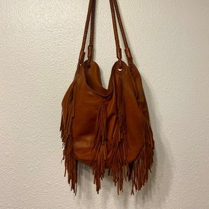 Genuine leather, soft fringe bag.